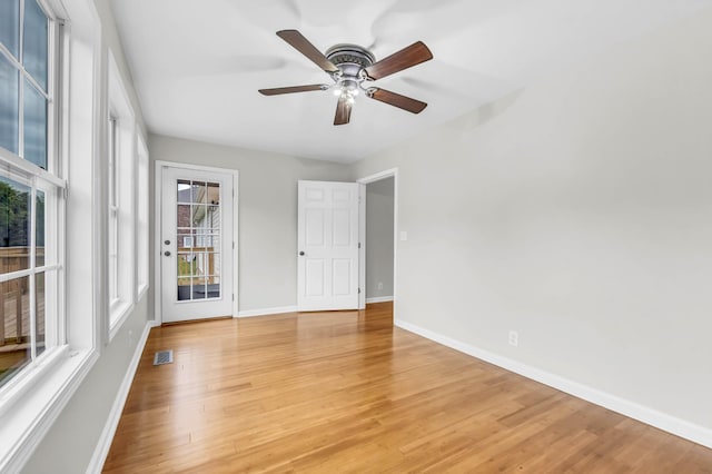 3190 Marthas Chapel Rd, Cunningham, TN 37052 - unfurnished room with light wood finished floors and a ceiling fan