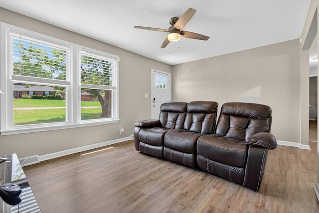609 Chrisman Dr, Clarksville, TN 37042 - living area with light wood-style flooring and ceiling fan