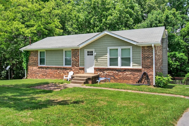609 Chrisman Dr, Clarksville, TN 37042 - ranch-style home featuring brick siding and a front lawn
