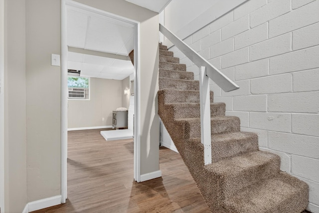 609 Chrisman Dr, Clarksville, TN 37042 - staircase with wood finished floors and baseboards