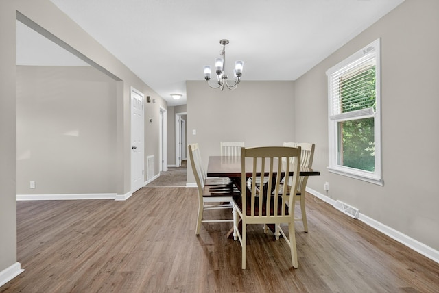 609 Chrisman Dr, Clarksville, TN 37042 - dining space featuring a chandelier and wood finished floors