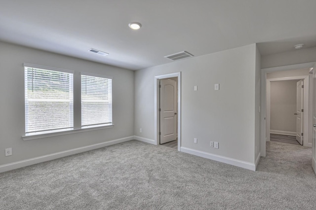 1753 Flora Grv, Hermitage, TN 37076 - carpeted empty room featuring baseboards and a smoke detector