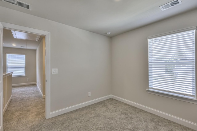 1753 Flora Grv, Hermitage, TN 37076 - unfurnished room featuring attic access, light colored carpet, and a smoke detector
