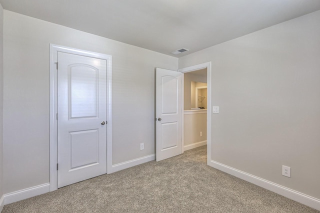 1753 Flora Grv, Hermitage, TN 37076 - unfurnished bedroom featuring light carpet and baseboards