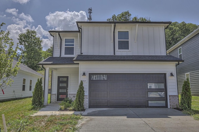 1753 Flora Grv, Hermitage, TN 37076 - view of front of property with board and batten siding, a garage, and concrete driveway