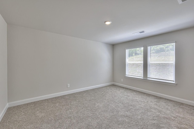 1753 Flora Grv, Hermitage, TN 37076 - carpeted spare room featuring baseboards and recessed lighting