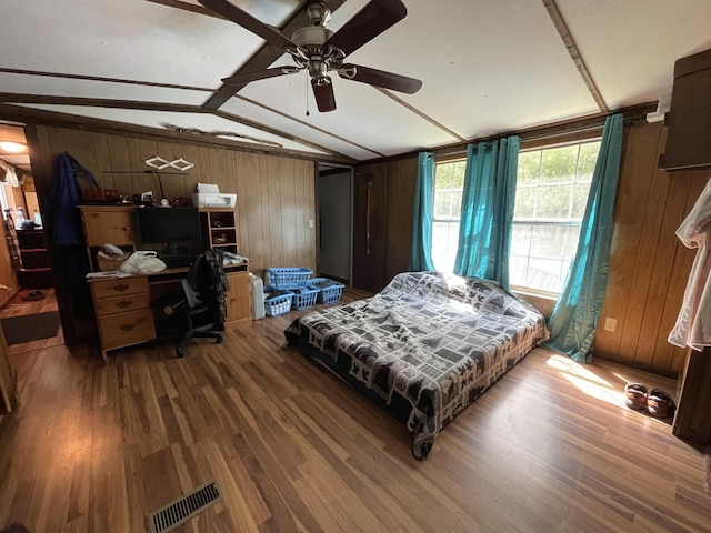 3406 Lowes Gap Rd, Pikeville, TN 37367 - bedroom with wood walls, wood finished floors, an office area, and ceiling fan