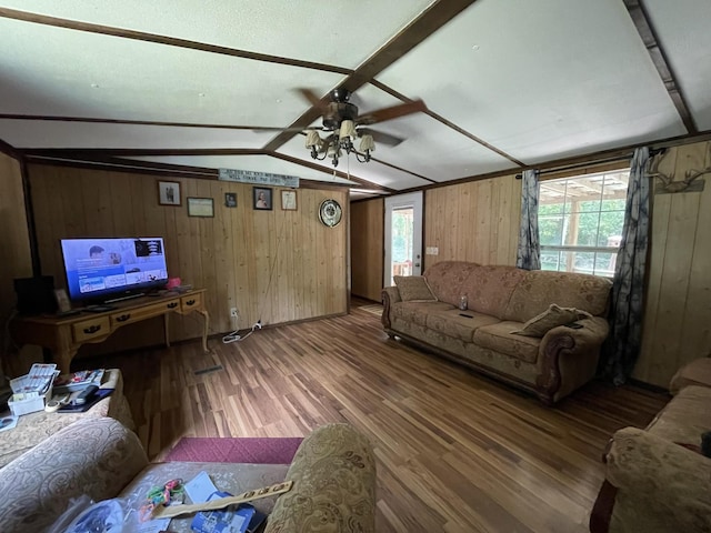 3406 Lowes Gap Rd, Pikeville, TN 37367 - living room featuring wood finished floors, wooden walls, and a ceiling fan