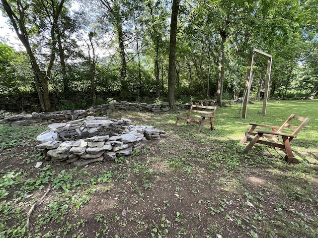 3406 Lowes Gap Rd, Pikeville, TN 37367 - view of green lawn featuring a fire pit