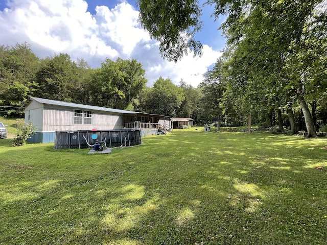 3406 Lowes Gap Rd, Pikeville, TN 37367 - view of green lawn with an outdoor pool