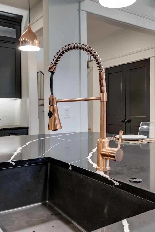 1050 Garton Rd, Burns, TN 37029 - kitchen view of dark cabinets and pendant lighting