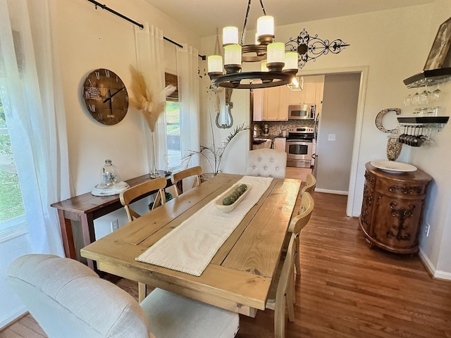 4417 Jackson Hollow Rd, Franklin, TN 37064 - dining space featuring a chandelier and dark wood-style floors
