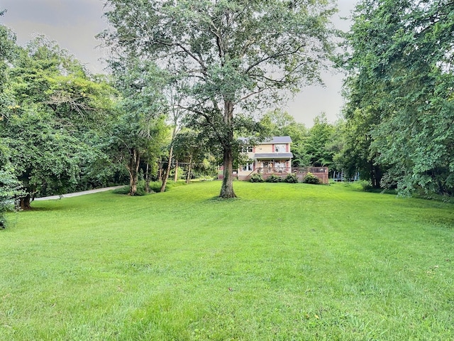 4417 Jackson Hollow Rd, Franklin, TN 37064 - view of grassy yard with a wooden deck