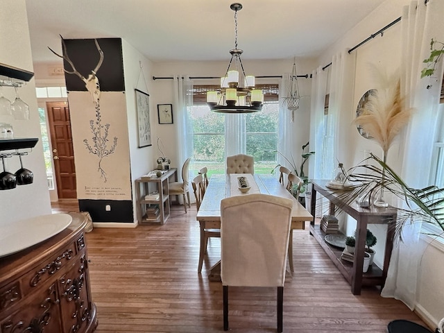 4417 Jackson Hollow Rd, Franklin, TN 37064 - dining space featuring a chandelier and wood finished floors