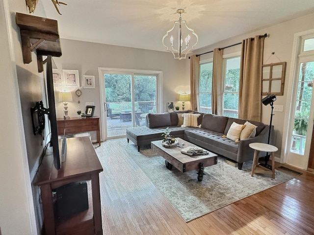 4417 Jackson Hollow Rd, Franklin, TN 37064 - living room featuring hardwood / wood-style floors and a chandelier