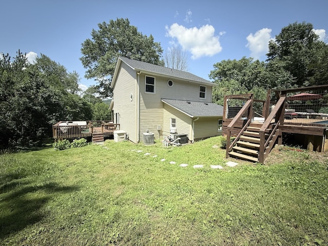 4417 Jackson Hollow Rd, Franklin, TN 37064 - back of property with a wooden deck, a yard, and stairway