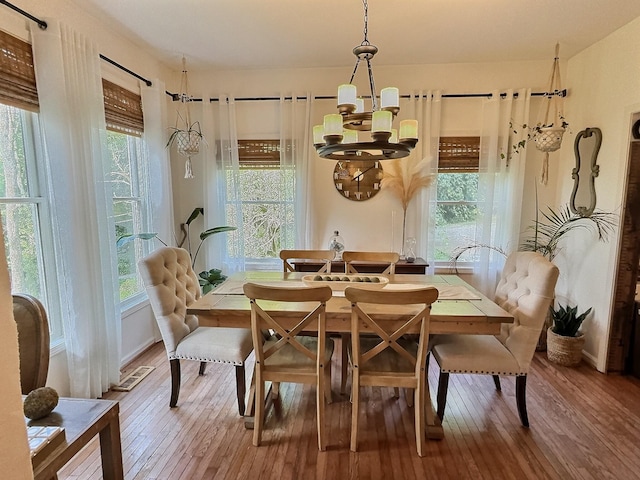 4417 Jackson Hollow Rd, Franklin, TN 37064 - dining room with a chandelier and hardwood / wood-style floors