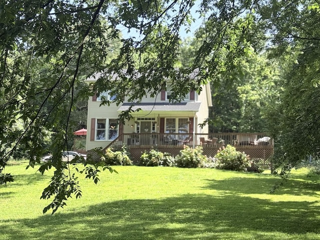 4417 Jackson Hollow Rd, Franklin, TN 37064 - view of property hidden behind natural elements featuring a front lawn and a porch