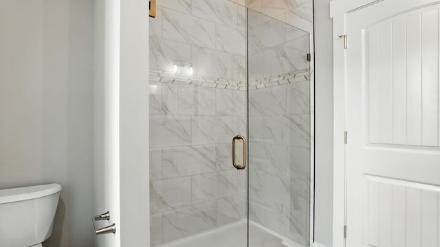 570 Main St S, Ashland City, TN 37015 - bathroom featuring a marble finish shower and toilet