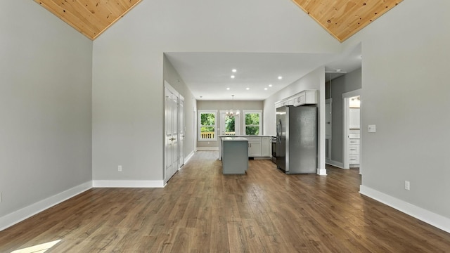 570 Main St S, Ashland City, TN 37015 - kitchen featuring freestanding refrigerator, a kitchen island, wooden ceiling, wood finished floors, and open floor plan