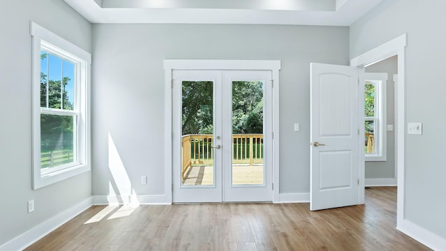 570 Main St S, Ashland City, TN 37015 - doorway to outside with french doors, wood finished floors, and healthy amount of natural light
