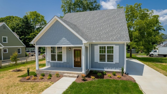 570 Main St S, Ashland City, TN 37015 - view of front of property featuring board and batten siding, a porch, and a shingled roof