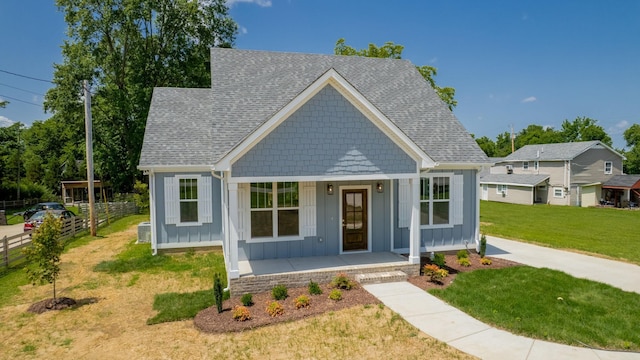 570 Main St S, Ashland City, TN 37015 - bungalow featuring board and batten siding, covered porch, and a shingled roof