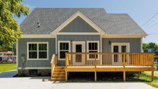 570 Main St S, Ashland City, TN 37015 - view of front facade featuring a shingled roof, board and batten siding, and a deck