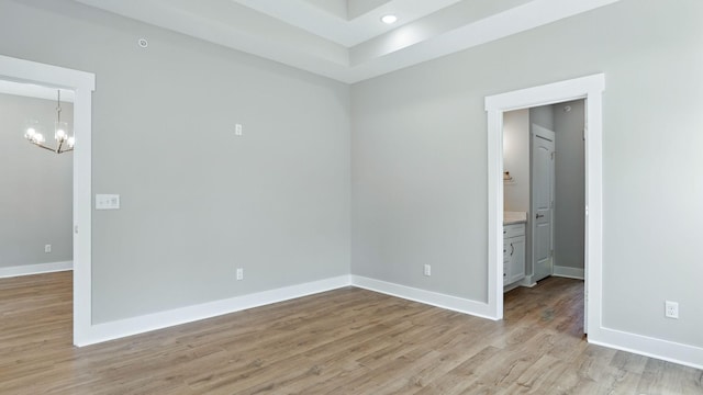 570 Main St S, Ashland City, TN 37015 - unfurnished room featuring a chandelier, light wood-style flooring, and recessed lighting