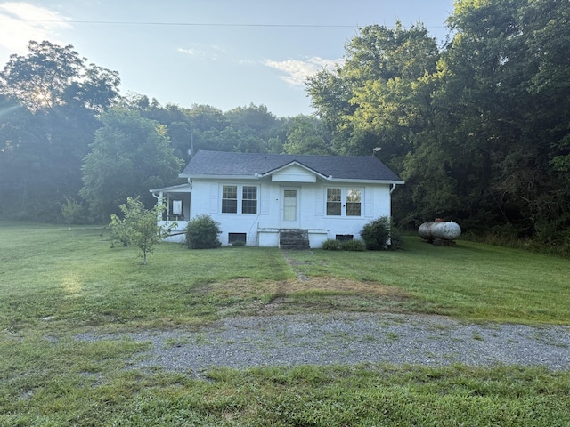 620 Champ Rd, Kelso, TN 37348 - view of front facade featuring a front yard and a view of trees