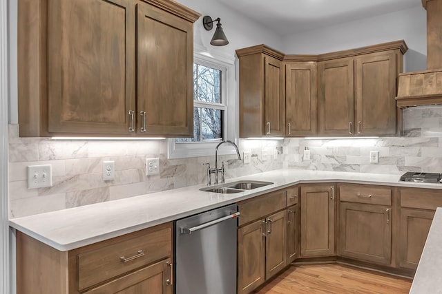 418 Stonemeadow Rd, Clarksville, TN 37043 - kitchen with stainless steel appliances, light countertops, tasteful backsplash, and brown cabinets