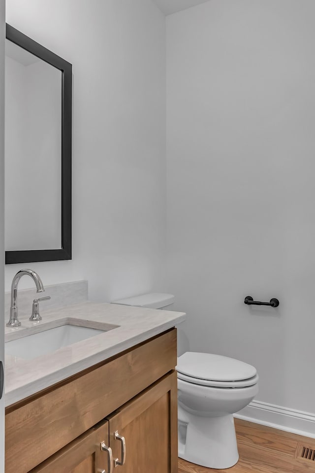 418 Stonemeadow Rd, Clarksville, TN 37043 - half bathroom with vanity and wood finished floors