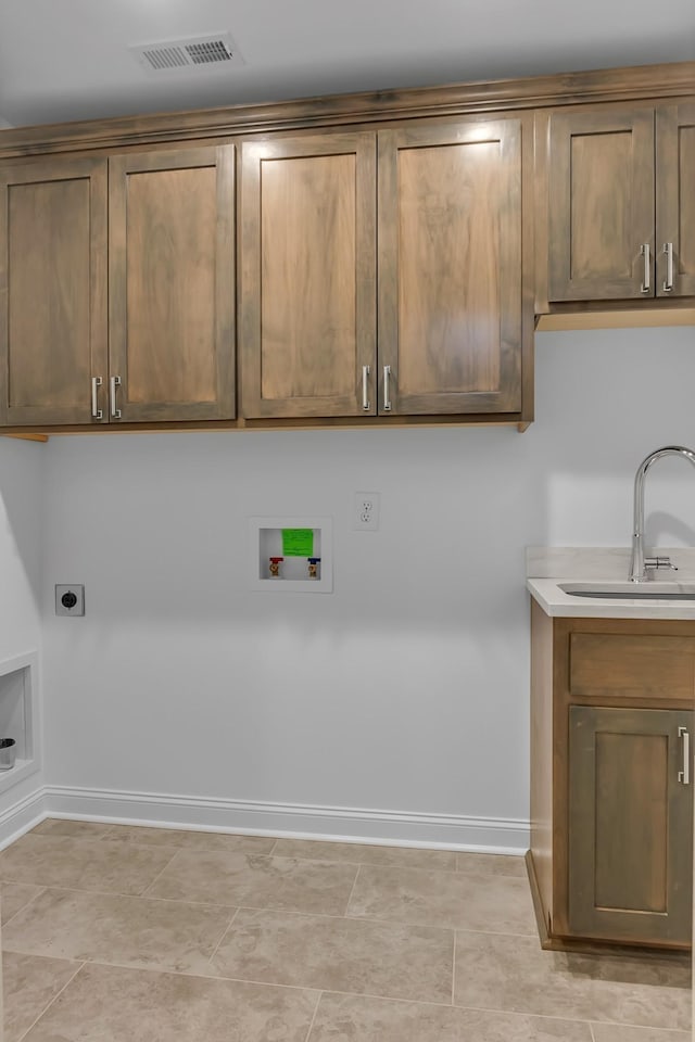 418 Stonemeadow Rd, Clarksville, TN 37043 - laundry room featuring washer hookup, cabinet space, and electric dryer hookup
