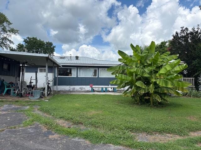 102 Thorogood St, Cowan, TN 37318 - view of front of house with a front lawn