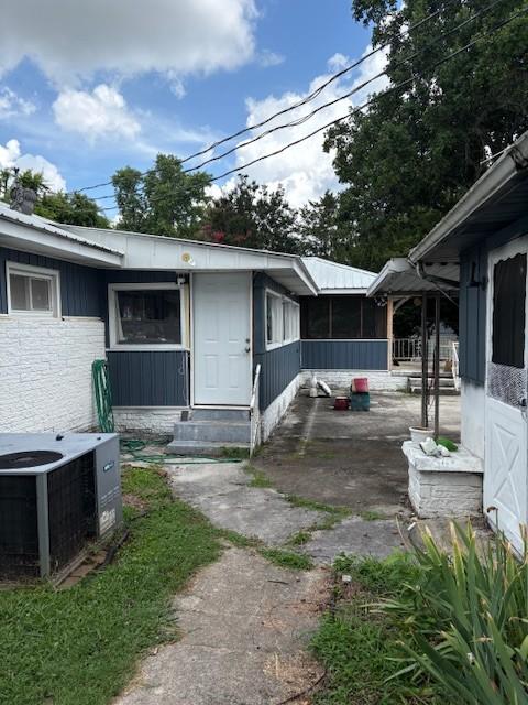 102 Thorogood St, Cowan, TN 37318 - view of side of property featuring a central air condition unit and entry steps