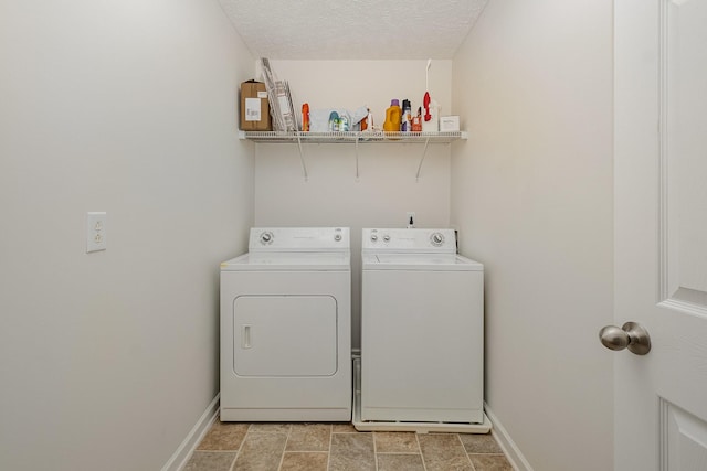 4817 Laura Jeanne Blvd, Murfreesboro, TN 37129 - laundry room featuring washing machine and clothes dryer and a textured ceiling