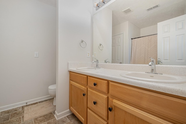 4817 Laura Jeanne Blvd, Murfreesboro, TN 37129 - bathroom with double vanity and a textured ceiling