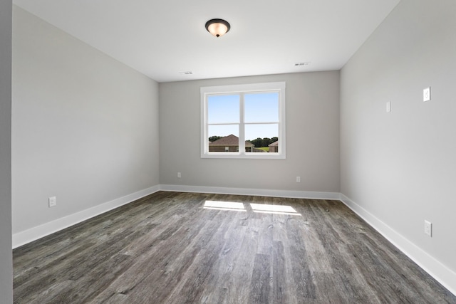 15 Aurora Cir, Fayetteville, TN 37334 - spare room with dark wood-type flooring and baseboards