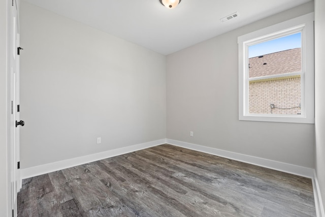 15 Aurora Cir, Fayetteville, TN 37334 - unfurnished room featuring baseboards and dark wood-type flooring