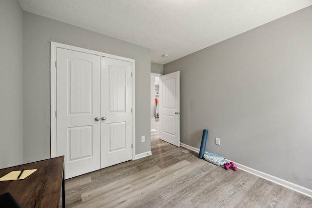 332 Riddle Ln, Estill Springs, TN 37330 - unfurnished bedroom featuring wood finished floors and a closet