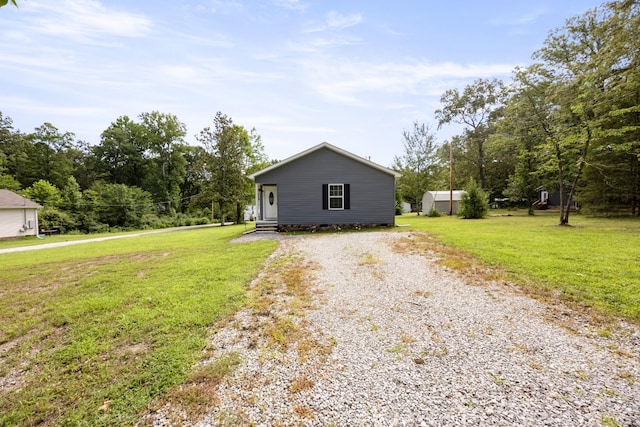 332 Riddle Ln, Estill Springs, TN 37330 - view of front of house with driveway and a front yard