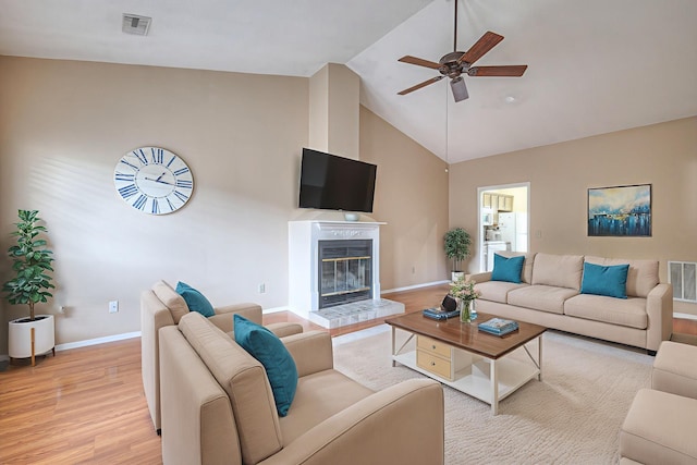 302 Laurel Hill Dr, Old Hickory, TN 37138 - living area with high vaulted ceiling, ceiling fan, light wood-style flooring, and a high end fireplace