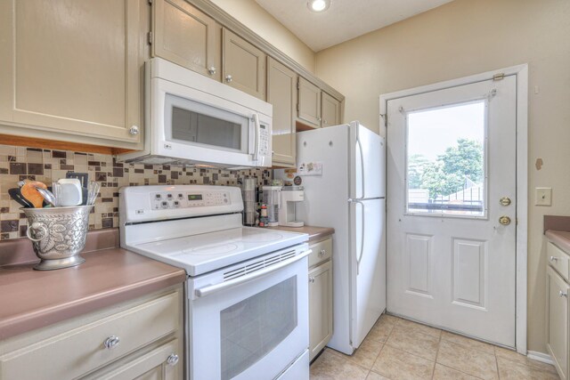 302 Laurel Hill Dr, Old Hickory, TN 37138 - kitchen featuring white appliances, tasteful backsplash, light tile patterned floors, and light countertops