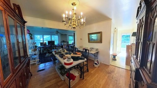204 Fisher Ave, Carthage, TN 37030 - dining area with a ceiling fan, wood finished floors, a chandelier, an office area, and crown molding