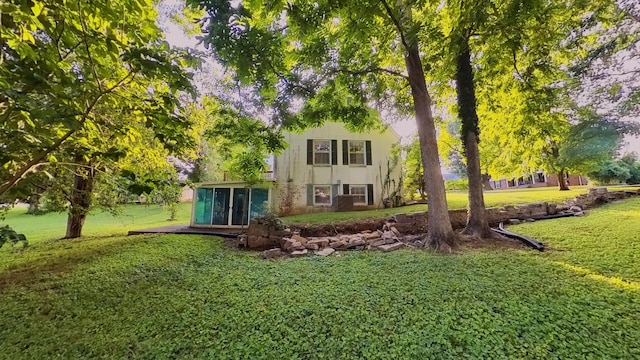 204 Fisher Ave, Carthage, TN 37030 - view of green lawn with a sunroom