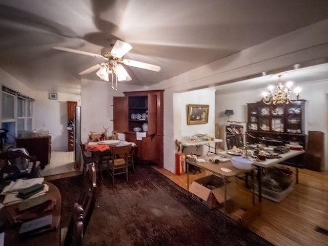 204 Fisher Ave, Carthage, TN 37030 - dining room with wood finished floors, ceiling fan, and a chandelier
