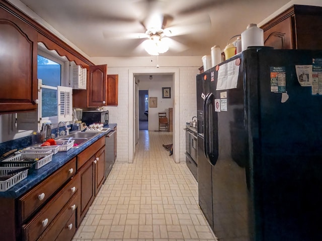 204 Fisher Ave, Carthage, TN 37030 - kitchen featuring black refrigerator with ice dispenser, stainless steel microwave, brick patterned floors, stove, and a ceiling fan