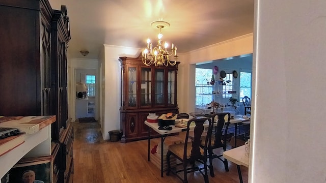 204 Fisher Ave, Carthage, TN 37030 - dining room featuring a chandelier, wood finished floors, and ornamental molding