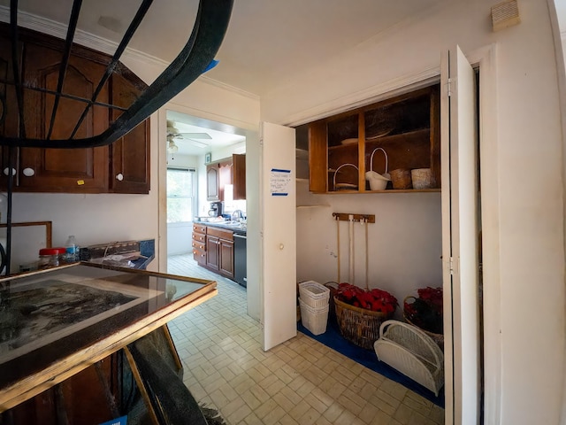 204 Fisher Ave, Carthage, TN 37030 - kitchen featuring brick patterned floors, ceiling fan, and stainless steel dishwasher