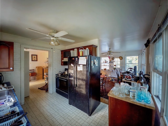 204 Fisher Ave, Carthage, TN 37030 - kitchen featuring black appliances, a ceiling fan, brick patterned flooring, and reddish brown cabinets
